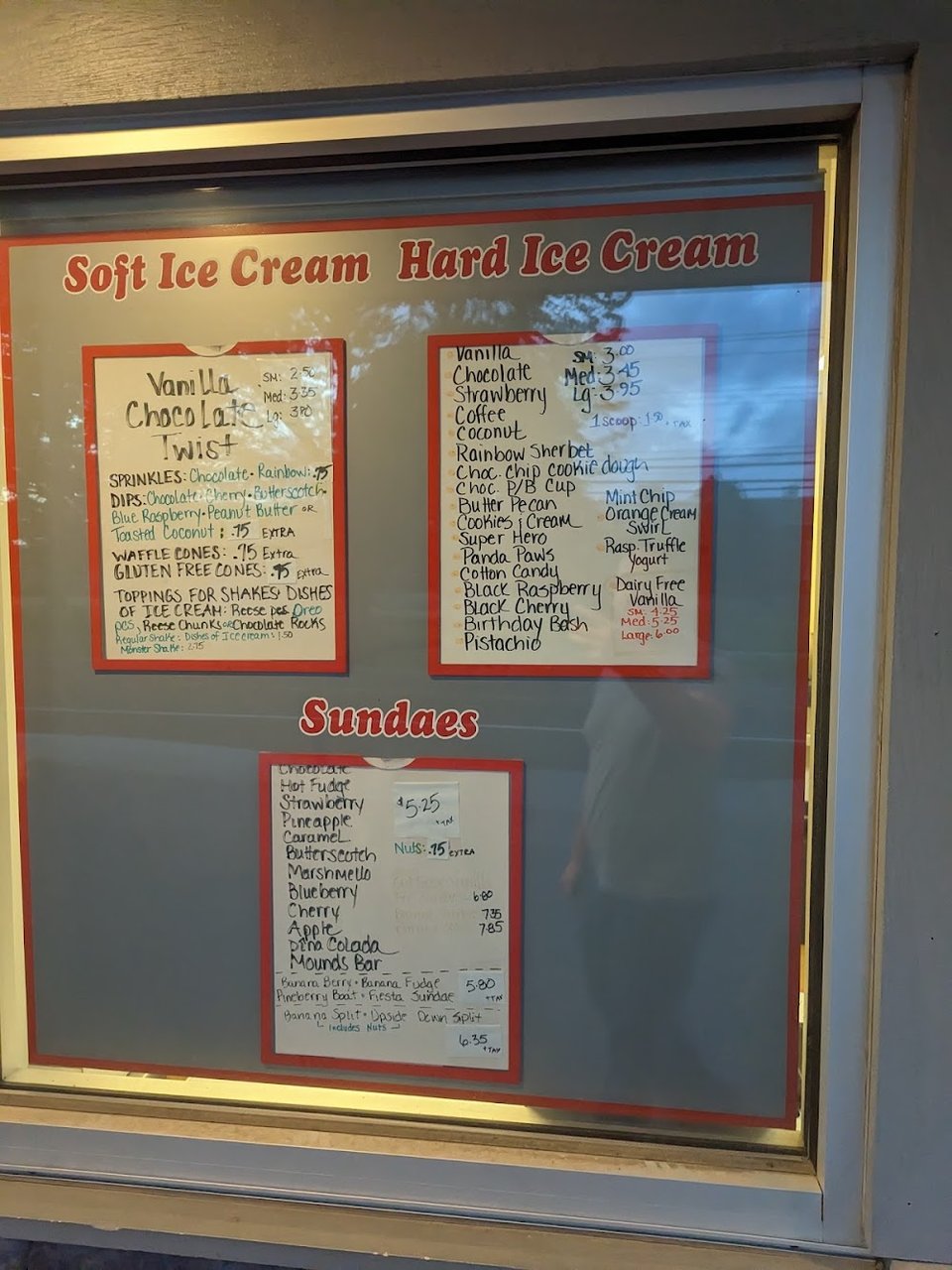 Menu page with burgers and grilled sandwiches.